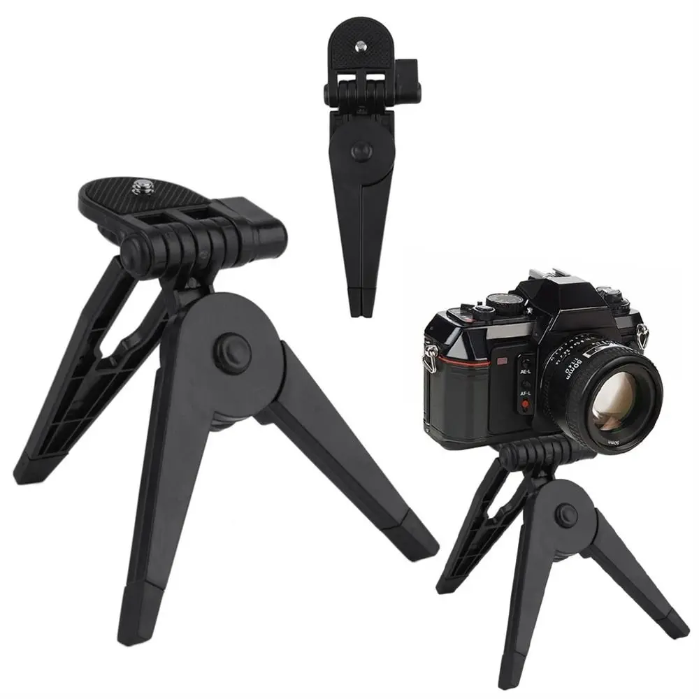 1/4" Screws SLR Tripod Stand Tripods Accessories Plastic Portable SLR Camera Mini Tripod Camera Tripod for SLR Camera 
1/4" Screws SLR Tripod Stand Tripods Accessories Plastic Portable SLR Camera Mini Tripod Camera Tripod for SLR Camera