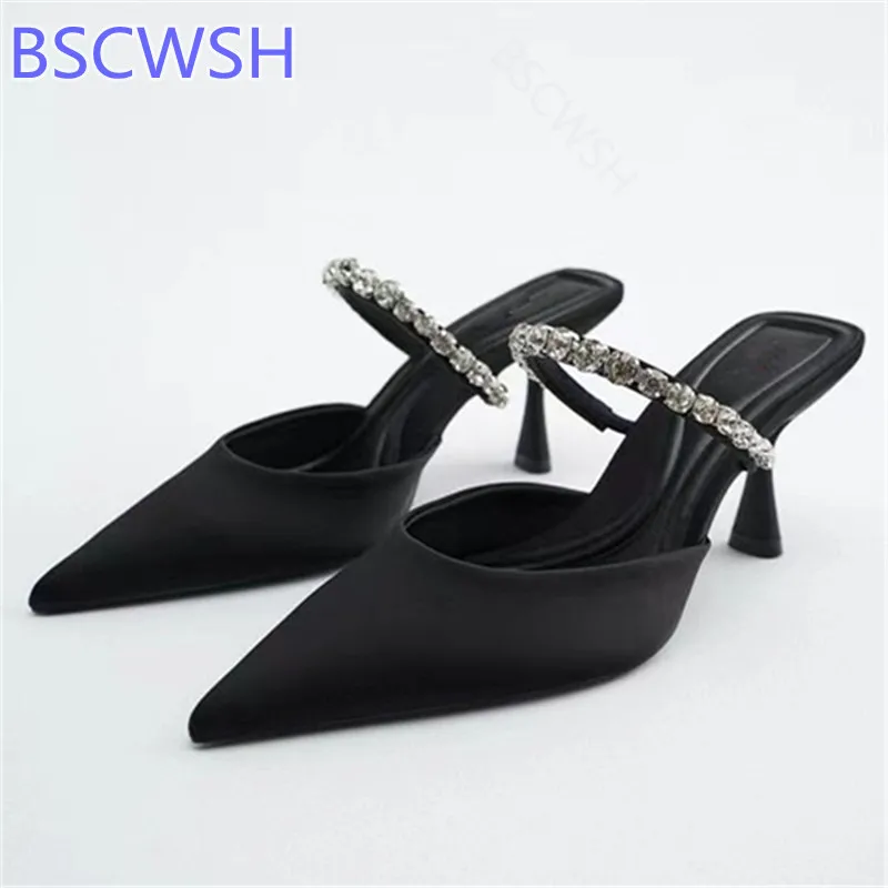 2022 Spring New Trend Women Shoes Black Satin Rhinestone Bling Decoration High Heel Pointed Toe Back Empty Mules Woman Slippers
2022 Spring New Trend Women Shoes Black Satin Rhinestone Bling Decoration High Heel Pointed Toe Back Empty Mules Woman Slippers