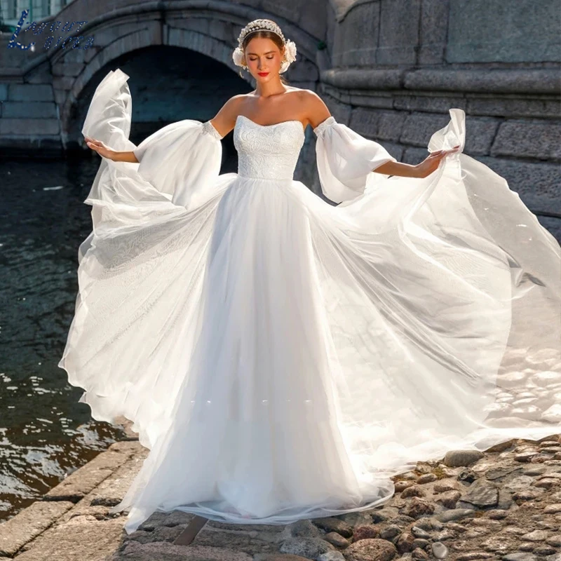 Sweetheart Tulle Wedding Dress Detachable Short Sleeves robe de mariée fluide Bridal Gown Women Elegant Lace Bride Custom Made
Sweetheart Tulle Wedding Dress Detachable Short Sleeves robe de mariée fluide Bridal Gown Women Elegant Lace Bride Custom Made