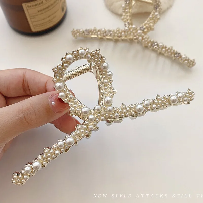 2022 New Elegant Geometric Metal Inlaid Pearl Hair Clip Headgear for Multi-haired Women Retro Fashion Hair Accessories
2022 New Elegant Geometric Metal Inlaid Pearl Hair Clip Headgear for Multi-haired Women Retro Fashion Hair Accessories