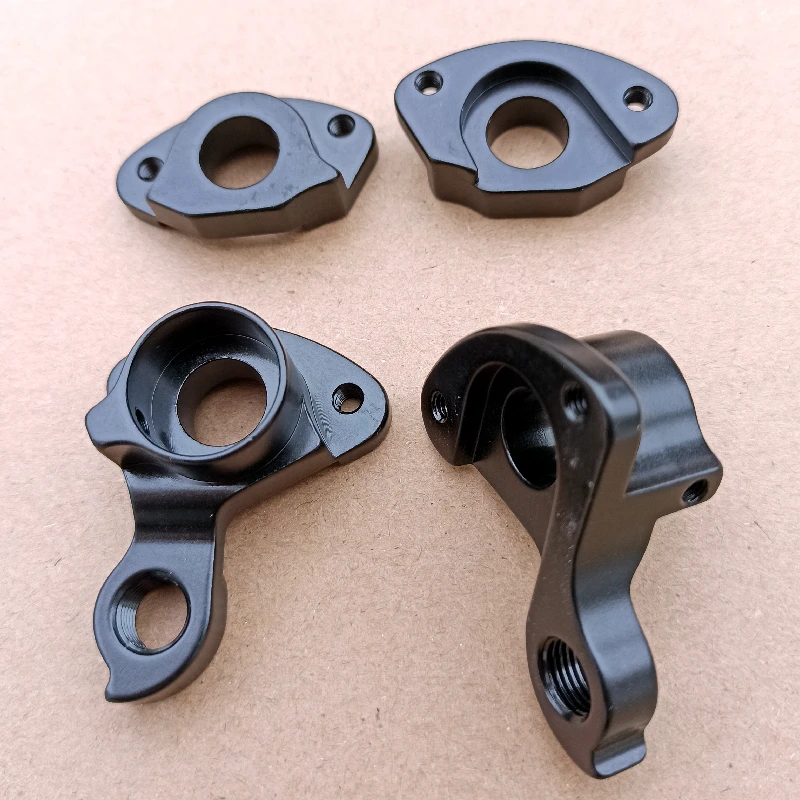 1pc Bicycle MECH dropout hook For Trident Thrust TRINX OEM Bike Axle Thru Quick Release carbon frame 142x12mm derailleur hanger
1pc Bicycle MECH dropout hook For Trident Thrust TRINX OEM Bike Axle Thru Quick Release carbon frame 142x12mm derailleur hanger