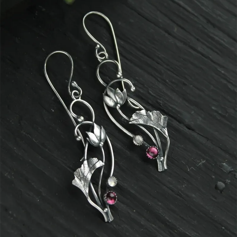 Vintage Metal Hand Carved Lotus Earrings Design Leaf Inlaid Red Crystal Drop Earrings
Vintage Metal Hand Carved Lotus Earrings Design Leaf Inlaid Red Crystal Drop Earrings