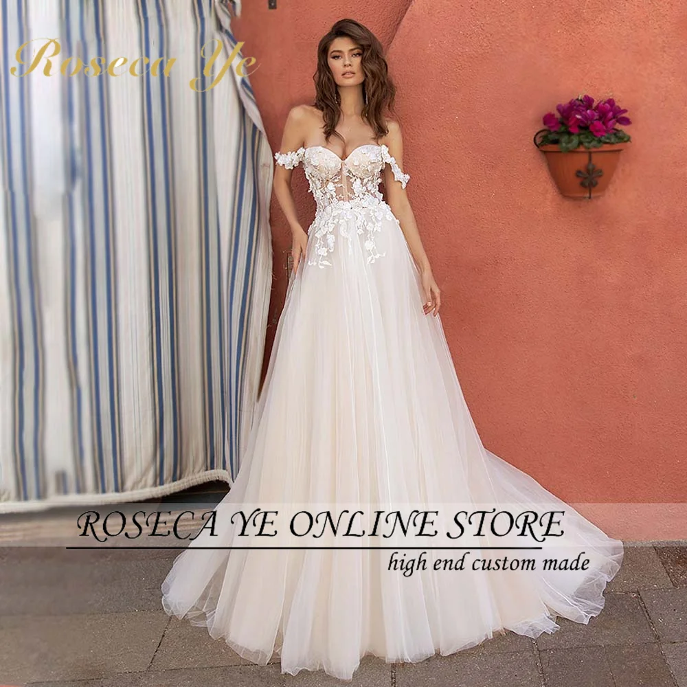 

Roseca Ye A-Line Wedding Dress 2022Romantic Sweetheart Backless Cap Sleeve Bride Beading Appliques Flowers Beach Bridal Gowns