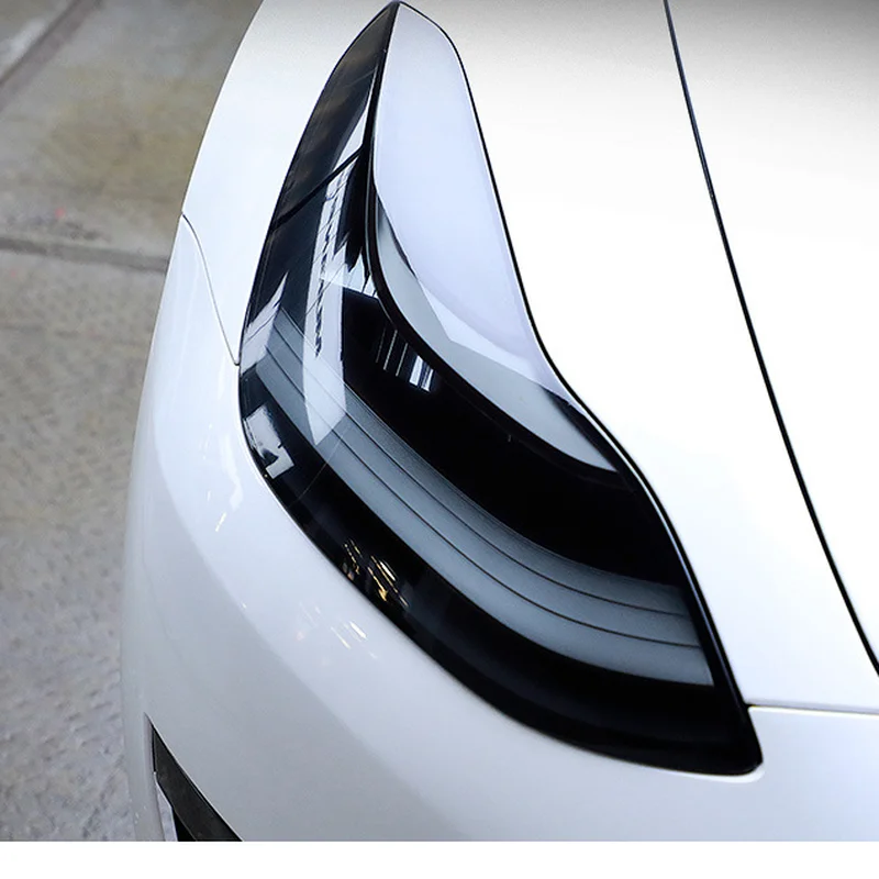 Стикер для передней фары автомобиля Tesla Model Y, фары ТПУ, дымчатые черные фары, защитная пленка, аксессуары, стикер
Стикер для передней фары автомобиля Tesla Model Y, фары ТПУ, дымчатые черные фары, защитная пленка, аксессуары, стикер
