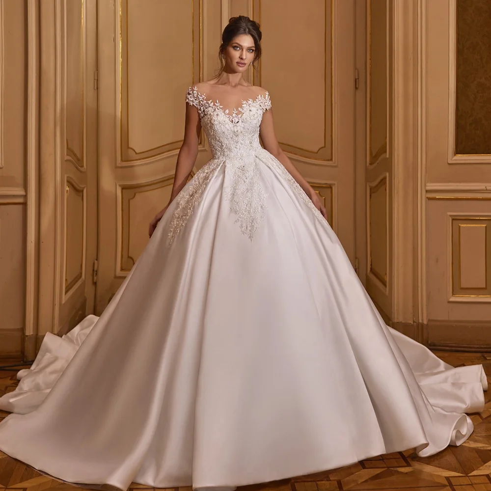 Romantic Ball Gown Wedding Dress 2023 Scoop Cap Sleeves Chapel Train Lace Flower Woman Bride Formal Party Gown Vestidos De Novia
Romantic Ball Gown Wedding Dress 2023 Scoop Cap Sleeves Chapel Train Lace Flower Woman Bride Formal Party Gown Vestidos De Novia