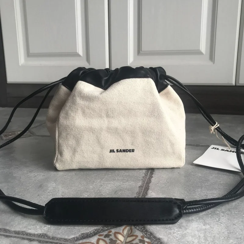 Drawstring Closure Canvas Bag Niche Design Shoulder Bag Fashion Leather Canvas Bucket Bag Women Handbags
Drawstring Closure Canvas Bag Niche Design Shoulder Bag Fashion Leather Canvas Bucket Bag Women Handbags