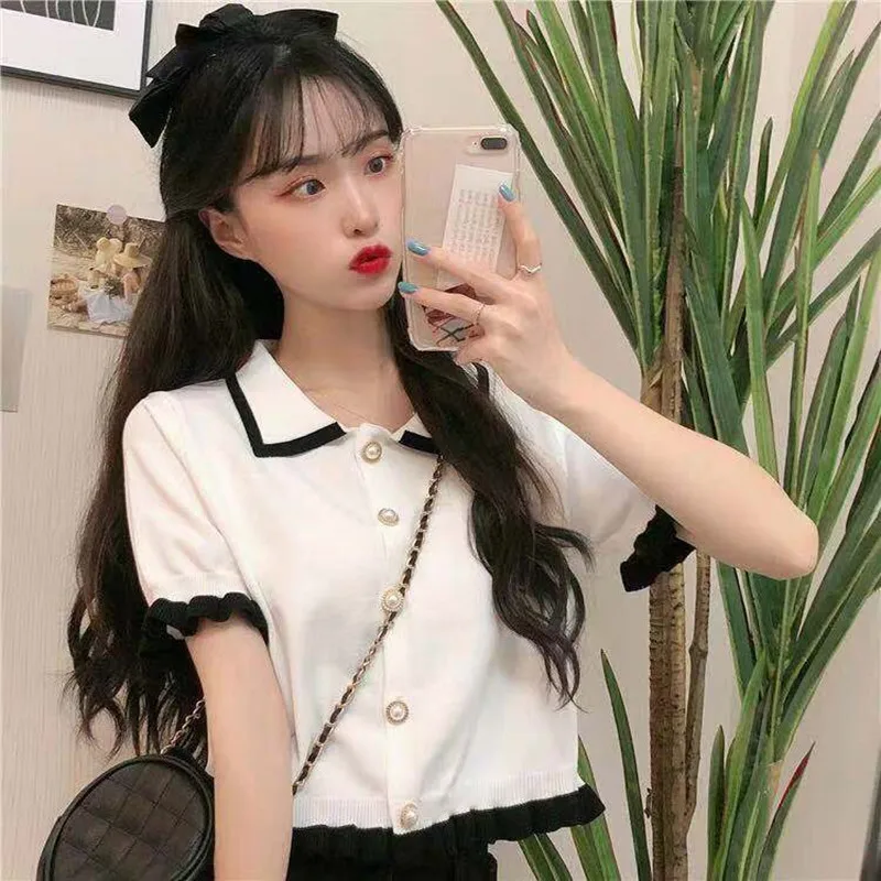 Design sense niche short-sleeved t-shirt women's summer 2022 new spring and summer clothes knitted doll collar short top
Design sense niche short-sleeved t-shirt women's summer 2022 new spring and summer clothes knitted doll collar short top