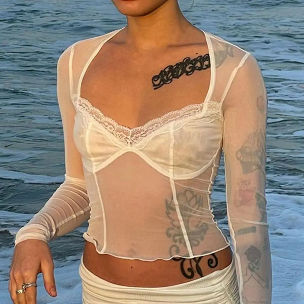 Y2K Sexy Mesh Women Blouse See Through Long Sleeve V Neck Slim Fit Stretchy Lace Stitching Clubwear Lady Crop Top for Daily Life 
Y2K Sexy Mesh Women Blouse See Through Long Sleeve V Neck Slim Fit Stretchy Lace Stitching Clubwear Lady Crop Top for Daily Life