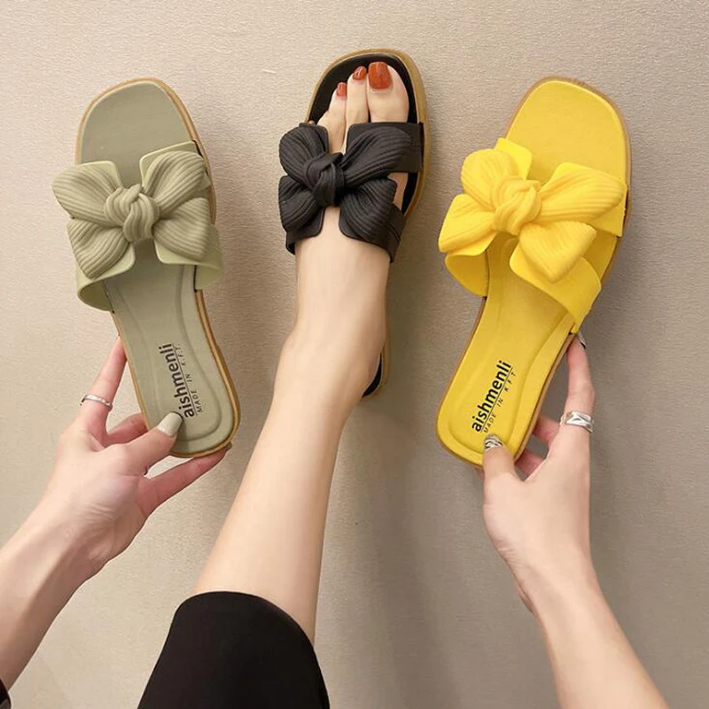 Flat-Soled Slippers Women 2022 Summer New Bow Black Non-Slip Ladies Sandals Outer Wear Beach Slippers
Flat-Soled Slippers Women 2022 Summer New Bow Black Non-Slip Ladies Sandals Outer Wear Beach Slippers