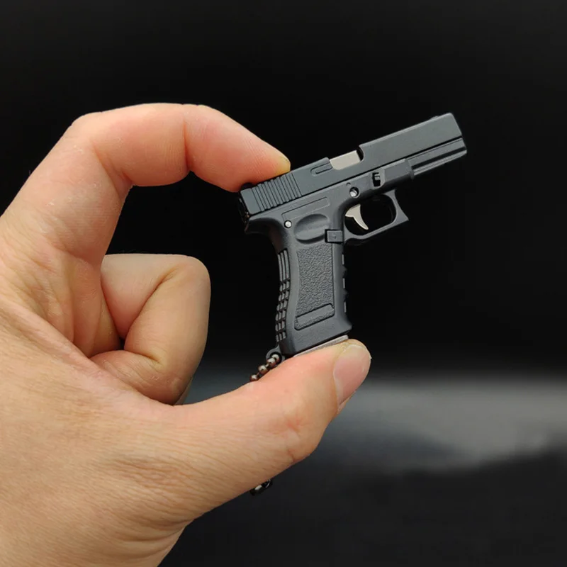 1Pcs 1:3 Mini Metal Desert Eagle Glock G17 Keychain with Metal Box Free Assembly Anti-stress Fidget Toys for Adult Collect New
1Pcs 1:3 Mini Metal Desert Eagle Glock G17 Keychain with Metal Box Free Assembly Anti-stress Fidget Toys for Adult Collect New