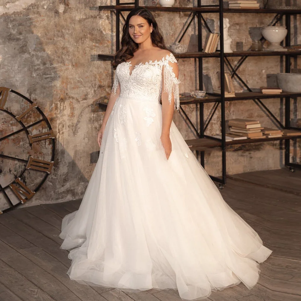 Plus Size Tulle Wedding Dress 2022 Lace Appliques Beaded Cap Sleeves A-Line Bridal Gown Vestido de Novia
Plus Size Tulle Wedding Dress 2022 Lace Appliques Beaded Cap Sleeves A-Line Bridal Gown Vestido de Novia