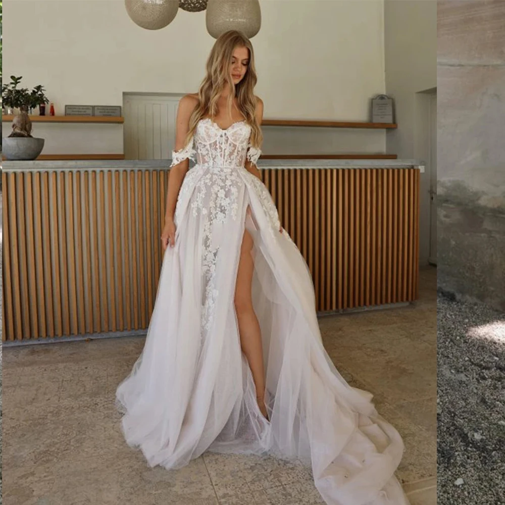 Bohemian Wedding Dresses Women's Sexy and Elegant Side High Split Tulle Lace Applique Off Shoulder Princess Bridal Gowns 2023 De
Bohemian Wedding Dresses Women's Sexy and Elegant Side High Split Tulle Lace Applique Off Shoulder Princess Bridal Gowns 2023 De