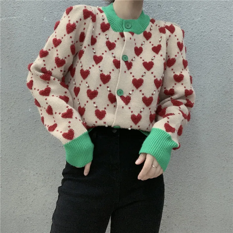 Jacquard long-sleeved short sweater female cardigan female Korean version of temperament slim sweater top tide
Jacquard long-sleeved short sweater female cardigan female Korean version of temperament slim sweater top tide
