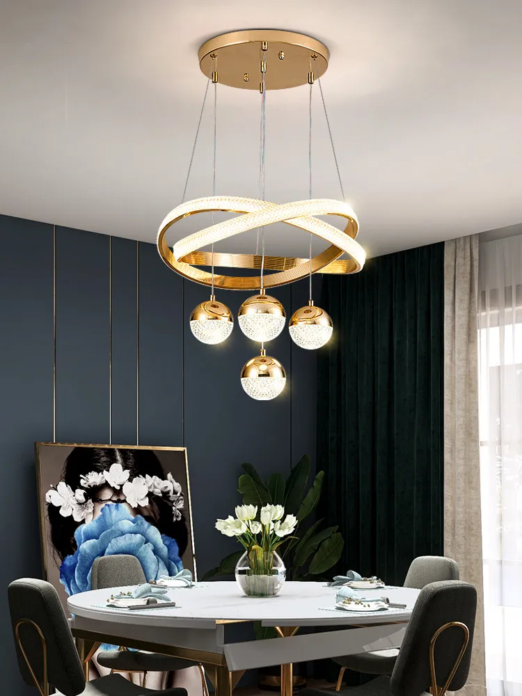 modern minimalist Light luxury chandelier Nordic designer art three-head bedroom round table dining room pendant lamps
modern minimalist Light luxury chandelier Nordic designer art three-head bedroom round table dining room pendant lamps
