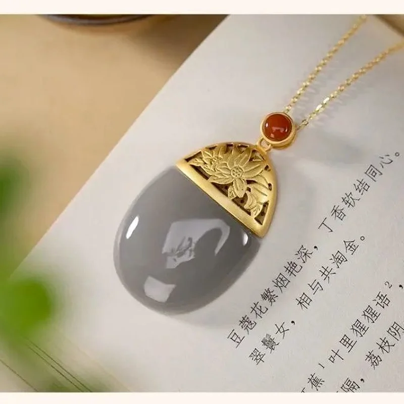 New silver inlaid natural Hotan long pendant necklace, elegant and fresh brand jewelry for Chinese charming women
New silver inlaid natural Hotan long pendant necklace, elegant and fresh brand jewelry for Chinese charming women