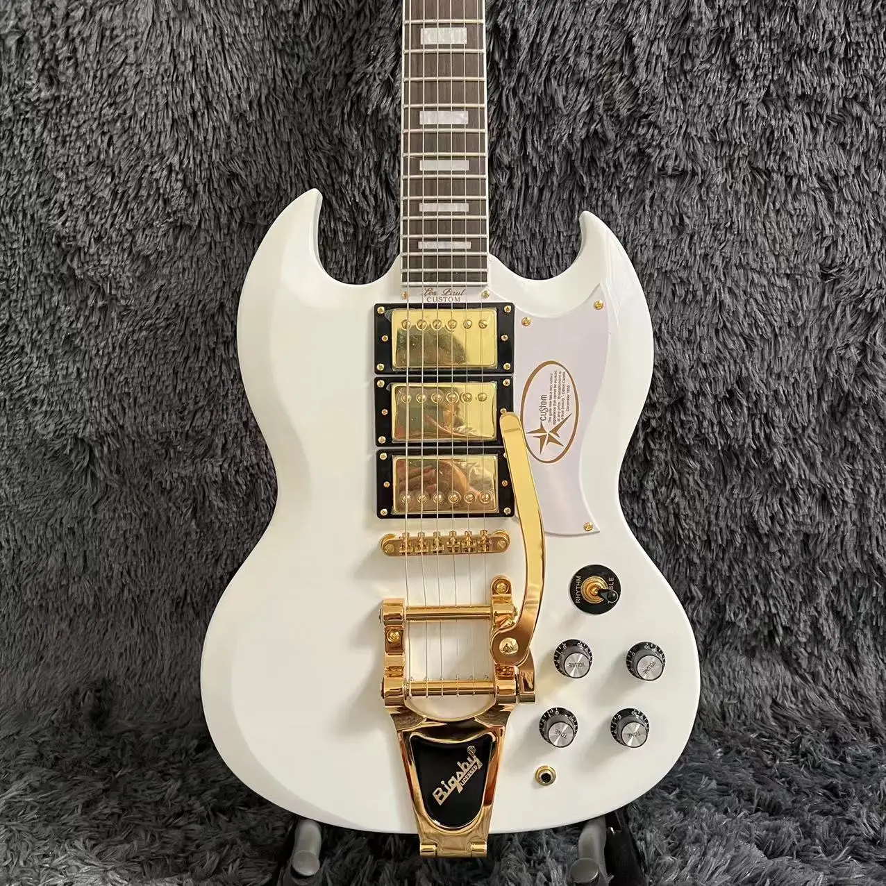 

SG Electric Guitar Rosewood Fingerboard Golden Hardware with Bigsby Tremolo System 3 Pickups Free Shipping