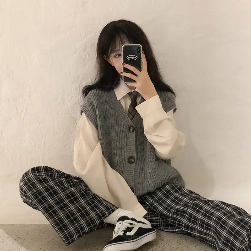 Women V-Neck Sleeveless Sweater Vest Knitted 2022 Jumper Spring Autumn Split White Korean Preppy Pullover Loose Top Casual t101
Women V-Neck Sleeveless Sweater Vest Knitted 2022 Jumper Spring Autumn Split White Korean Preppy Pullover Loose Top Casual t101