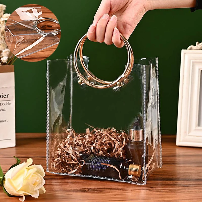 Transparent Tote Bag Portable Wedding Gift Round Ring Handbag Candy Flower Packaging Bag Fashion Shopping Bag PVC Storage Bags
Transparent Tote Bag Portable Wedding Gift Round Ring Handbag Candy Flower Packaging Bag Fashion Shopping Bag PVC Storage Bags