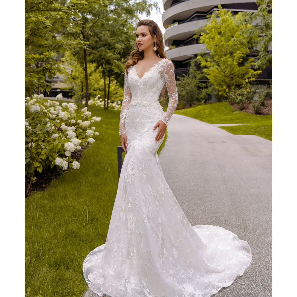 Elegant White Mermaid Wedding Dressses Charming Appliques V Neck Long Sleeves Bride Gowns Sexy Open Back Robe De Mariee
Elegant White Mermaid Wedding Dressses Charming Appliques V Neck Long Sleeves Bride Gowns Sexy Open Back Robe De Mariee