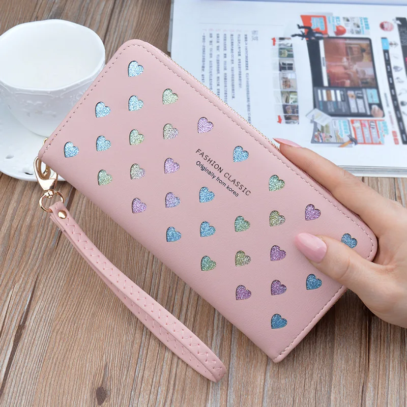 New Wallet Ladies Long Zipper Large Capacity Mobile Phone Bag Fashion Love Color Hollow Clutch Bag Handbags Women Bags Designer
New Wallet Ladies Long Zipper Large Capacity Mobile Phone Bag Fashion Love Color Hollow Clutch Bag Handbags Women Bags Designer