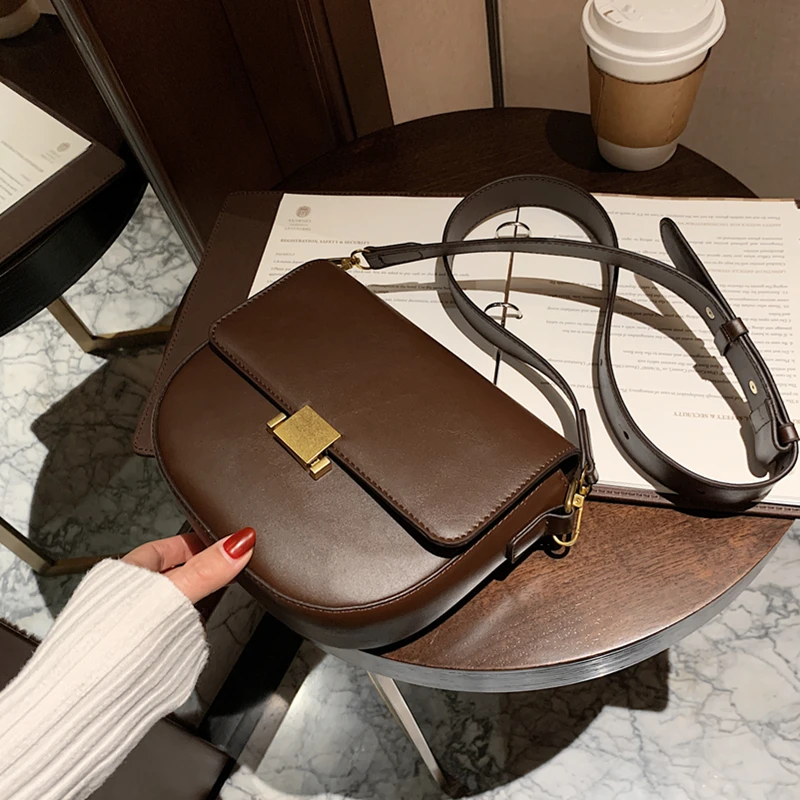 LEON Vintage Semicircle Saddle Shoulder Crossbody Bags For Women Brand Designer Push Lock Small Ladies Handbags Winter 2022
LEON Vintage Semicircle Saddle Shoulder Crossbody Bags For Women Brand Designer Push Lock Small Ladies Handbags Winter 2022