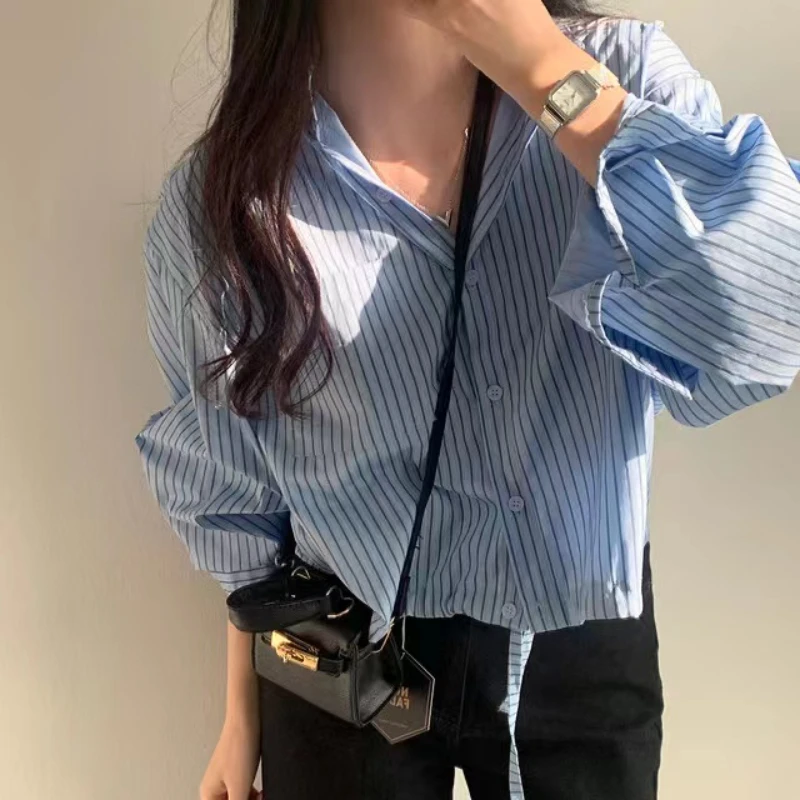 Новинка весны Vintaeg полосатая рубашка с лацканами и длинными рукавами Женская Базовая Корейская Свободная Повседневная рубашка с длинными рукавами 115Aliang 
Новинка весны Vintaeg полосатая рубашка с лацканами и длинными рукавами Женская Базовая Корейская Свободная Повседневная рубашка с длинными рукавами 115Aliang