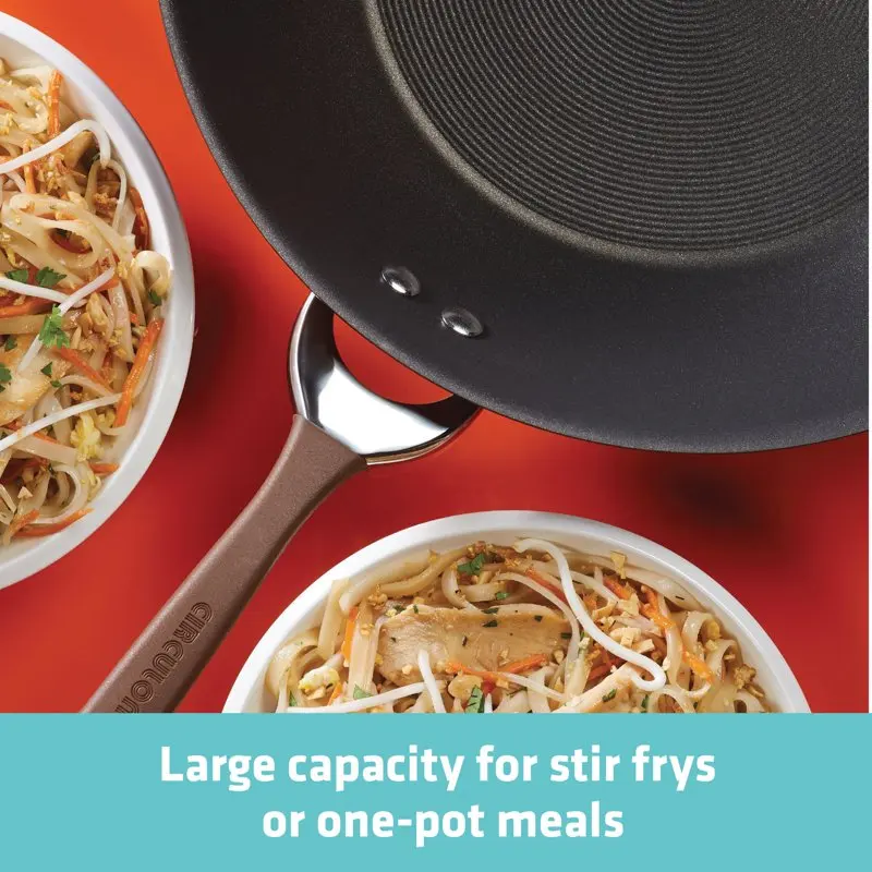 Luxuriously Designed Hard-Anodized 14-Inch Nonstick Induction Stir Fry Pan with Helper Handle, Delicately Chocolate-Colored.
Luxuriously Designed Hard-Anodized 14-Inch Nonstick Induction Stir Fry Pan with Helper Handle, Delicately Chocolate-Colored.
