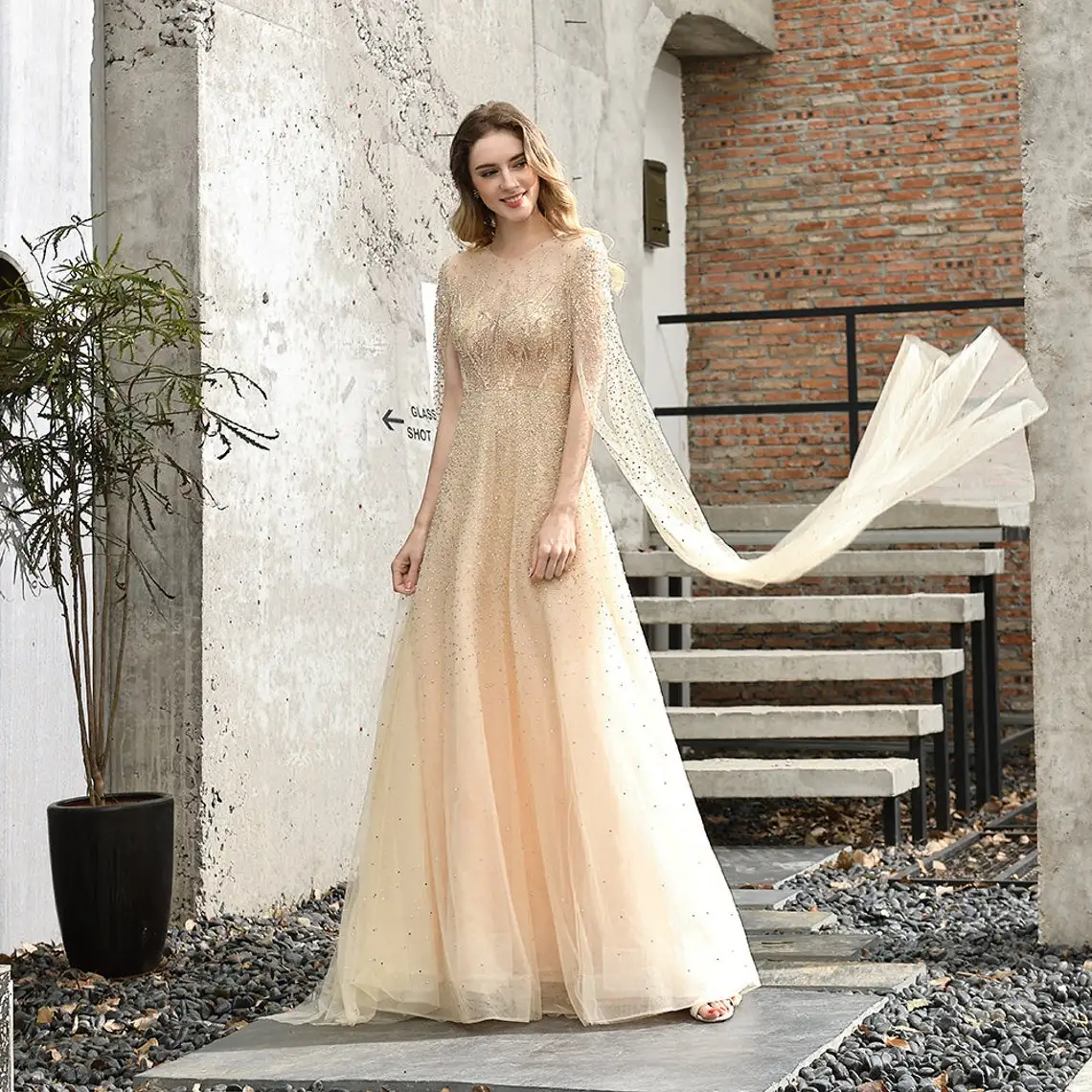 Exquisite Sequined Champagne Tulle Evening Gown Perspective Gauze Formal Party A Line Prom Dress with Elegant Long Sleeves
Exquisite Sequined Champagne Tulle Evening Gown Perspective Gauze Formal Party A Line Prom Dress with Elegant Long Sleeves