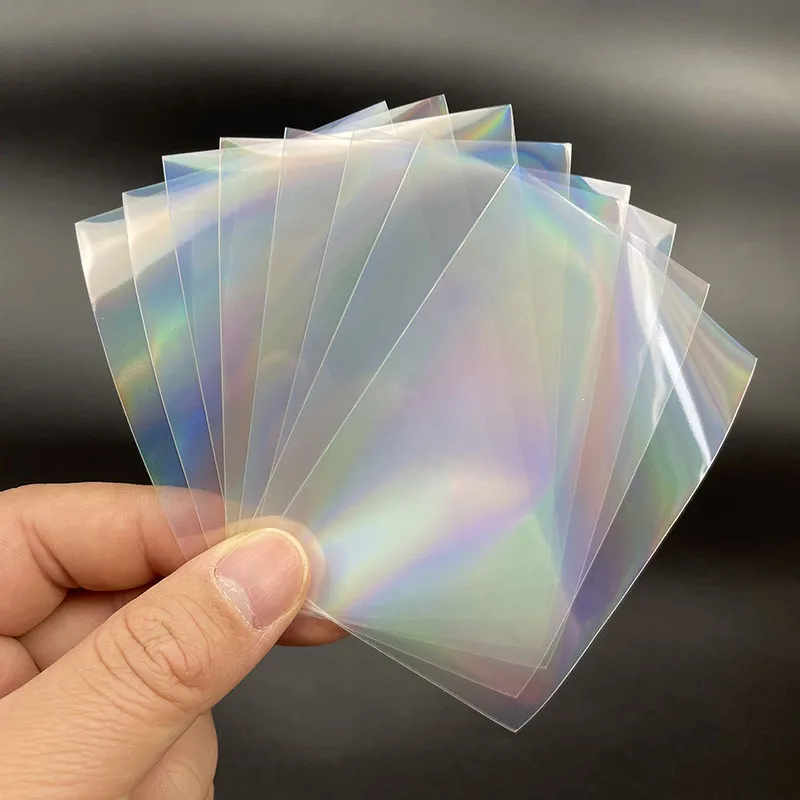 50PCS/LOT Rainbow Laser PP Card Sleeve Card Film Sleeves for Board Game Card Photo Protector Trading Cards Shield Cover
50PCS/LOT Rainbow Laser PP Card Sleeve Card Film Sleeves for Board Game Card Photo Protector Trading Cards Shield Cover