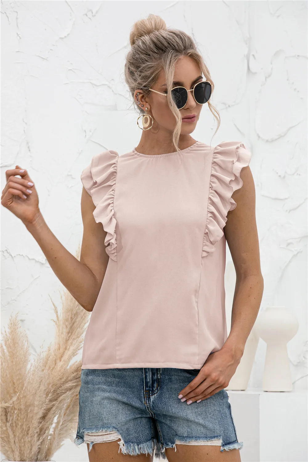 2022 European and American Summer New Women's Temperament Flounces With Round Collar Solid Color Vest
2022 European and American Summer New Women's Temperament Flounces With Round Collar Solid Color Vest