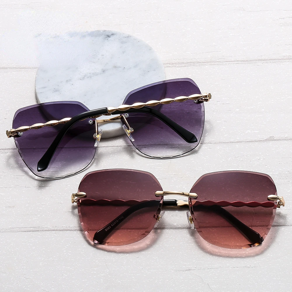 New Fashion Rimless Ladies Sunglasses Metal Cut Irregular Wave Sunglasses Europe and America Ocean Lens Glasses
New Fashion Rimless Ladies Sunglasses Metal Cut Irregular Wave Sunglasses Europe and America Ocean Lens Glasses