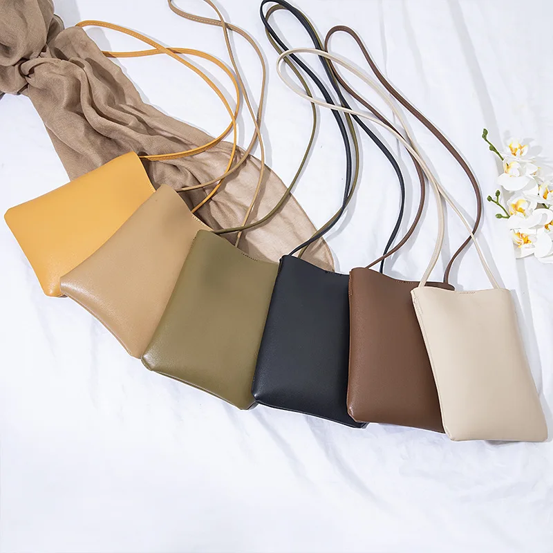 Vertical mini mobile phone bag summer Japanese fashion shoulder bag simple pu leather messenger bag
Vertical mini mobile phone bag summer Japanese fashion shoulder bag simple pu leather messenger bag