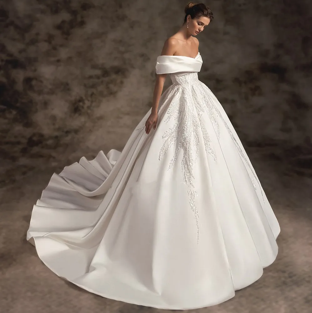 High Quality Satin A-Line Wedding Dress Beaded Pearls Embroidery Appliques Off The Shoulder Bridal Gown Robe De Mariage Custom
High Quality Satin A-Line Wedding Dress Beaded Pearls Embroidery Appliques Off The Shoulder Bridal Gown Robe De Mariage Custom