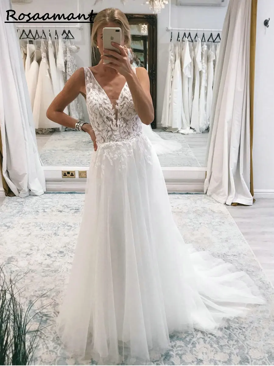 V-Neck Tulle Wedding Dress A-Line Sleeveless Illusion Appliques Lace Bridal Gown
V-Neck Tulle Wedding Dress A-Line Sleeveless Illusion Appliques Lace Bridal Gown