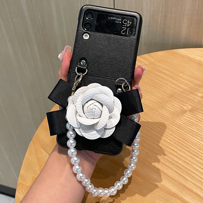 Luxury Women 3D Bow Leather Camellia Phone Case For Samsung Galaxy Z Flip 5 Z Flip 4 3 Portable Elegant Pearl Bracelet Cover
Luxury Women 3D Bow Leather Camellia Phone Case For Samsung Galaxy Z Flip 5 Z Flip 4 3 Portable Elegant Pearl Bracelet Cover