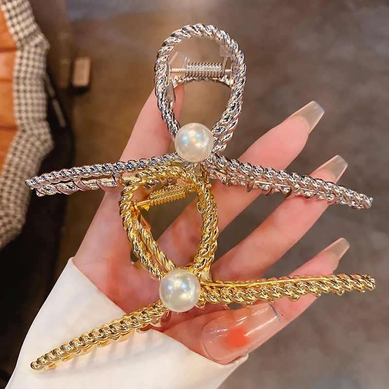 Pearl Fried Dough Twist Youzi Cross Hairpin Ins Style Simple Curling Hair, Back Of The Head Grip, Fashionable, Versatile, Net Re
Pearl Fried Dough Twist Youzi Cross Hairpin Ins Style Simple Curling Hair, Back Of The Head Grip, Fashionable, Versatile, Net Re