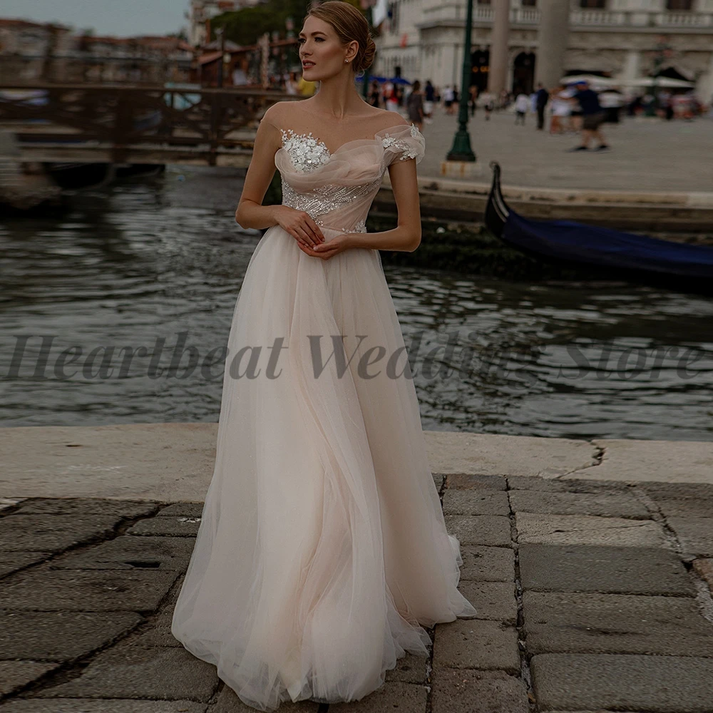 2023 Short Sleeve Wedding Dress Fashion A-Line Scoop Neck for Brides with Button Back Applique Sequins Beads Pearls Court Train
2023 Short Sleeve Wedding Dress Fashion A-Line Scoop Neck for Brides with Button Back Applique Sequins Beads Pearls Court Train