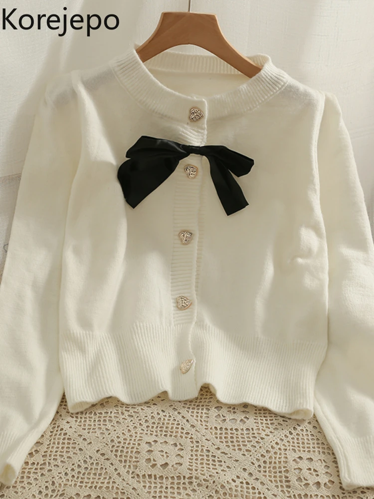 Корейский декоративный тонкий кардиган с бантом, Женский однобортный свитер на раннюю осень, топ 2022, универсальные модные свитера с круглым...
Корейский декоративный тонкий кардиган с бантом, Женский однобортный свитер на раннюю осень, топ 2022, универсальные модные свитера с круглым...