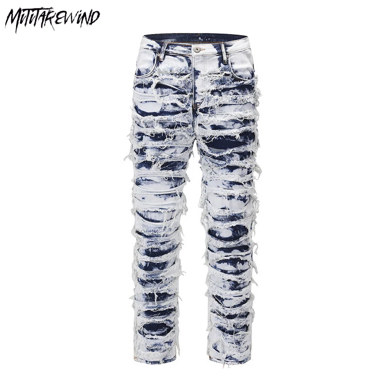 Женские рваные джинсы в стиле хип-хоп
Женские рваные джинсы в стиле хип-хоп