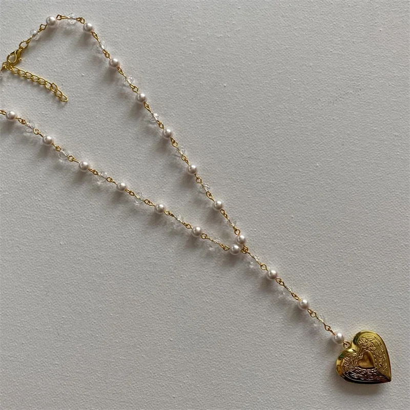 The Cupid’s Daydream Locket Necklace Handmade 00s Fairy core Casual Cottage core Coquette Beaded Chain Layered Necklace Rosary
The Cupid’s Daydream Locket Necklace Handmade 00s Fairy core Casual Cottage core Coquette Beaded Chain Layered Necklace Rosary