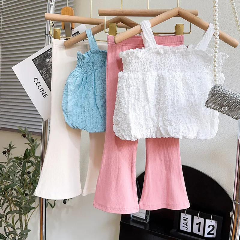 2023 New Summer Child Clothes Sets Sleeveless Ruched Loose Flare Pants White 2 Piece Sets Designer Girls Clothes Sets 18M-7T
2023 New Summer Child Clothes Sets Sleeveless Ruched Loose Flare Pants White 2 Piece Sets Designer Girls Clothes Sets 18M-7T