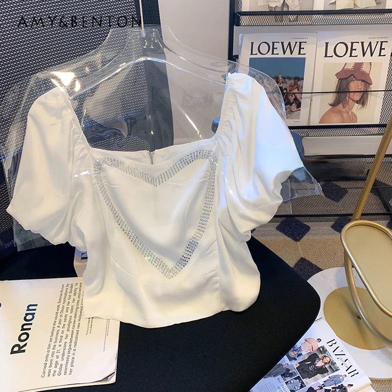 Women's Square Collar Blouse Heart Shape with Diamond Puff Sleeve Short Shirt Summer Elegant Zipper White Ladies Tops
Women's Square Collar Blouse Heart Shape with Diamond Puff Sleeve Short Shirt Summer Elegant Zipper White Ladies Tops