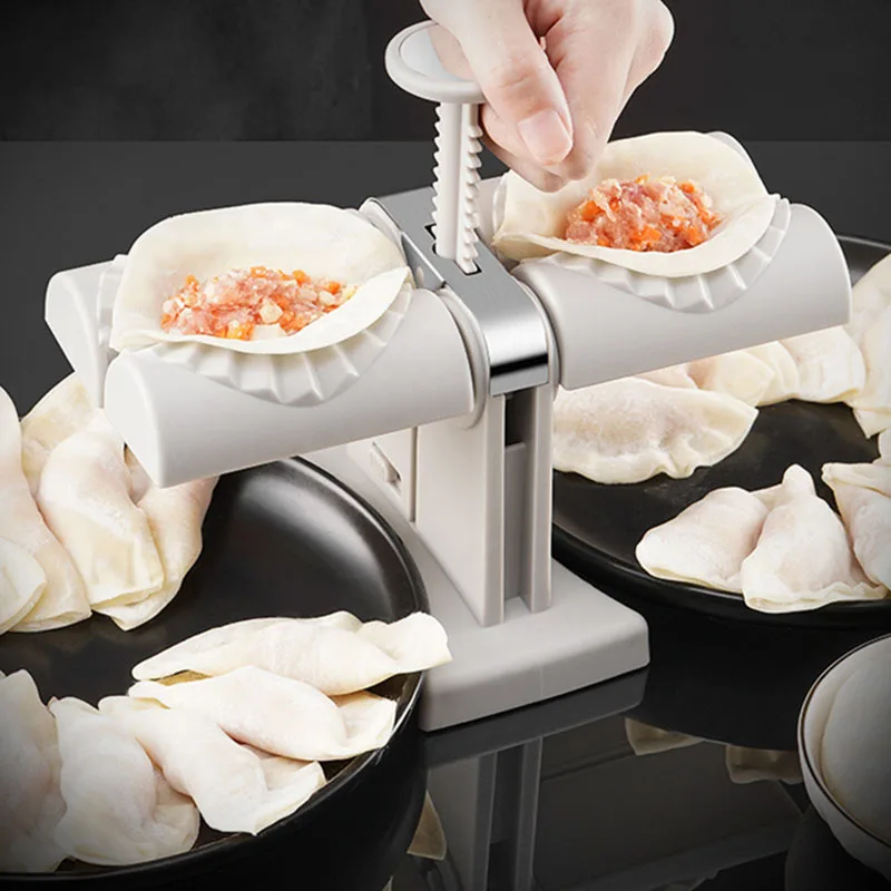 Double Head Automatic Dumpling Maker Dumpling Mould Quickly Make Dumplings Making Artifact Manual Press Dumpling Maker Gadget
Double Head Automatic Dumpling Maker Dumpling Mould Quickly Make Dumplings Making Artifact Manual Press Dumpling Maker Gadget