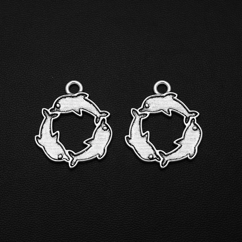 

10pcs/Lots 23x28mm Antique Silver Plated Dolphin Ring Charms Hollow Sea Life Animal Pendants For Diy Jewelery Accessories Crafts