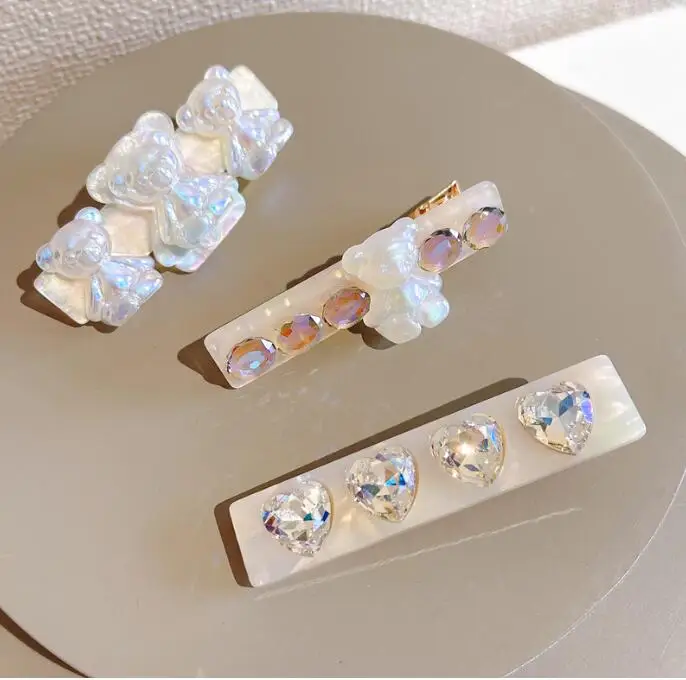 Cartoon bear clip Japanese acetate crystal hairpin summer hair side clip hairpin headwear
Cartoon bear clip Japanese acetate crystal hairpin summer hair side clip hairpin headwear