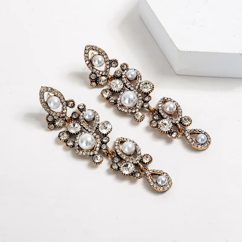 Vintage Palace Gold Color Pearl Hanging Wedding Baroque Bohemia Fine Drop Earring Female Elegant Earrings for Women Jewelry Gift
Vintage Palace Gold Color Pearl Hanging Wedding Baroque Bohemia Fine Drop Earring Female Elegant Earrings for Women Jewelry Gift