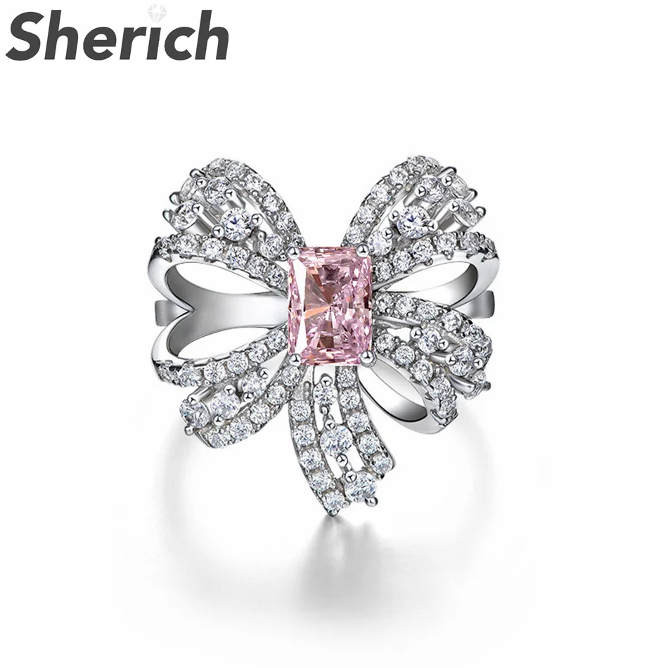 Sheric Bow 1.5ct Pink Rectangle Ice Flower Cut High Carbon Diamond 100% 925 Sterling Silver Luxury Charming Ring Women's Jewelry
Sheric Bow 1.5ct Pink Rectangle Ice Flower Cut High Carbon Diamond 100% 925 Sterling Silver Luxury Charming Ring Women's Jewelry