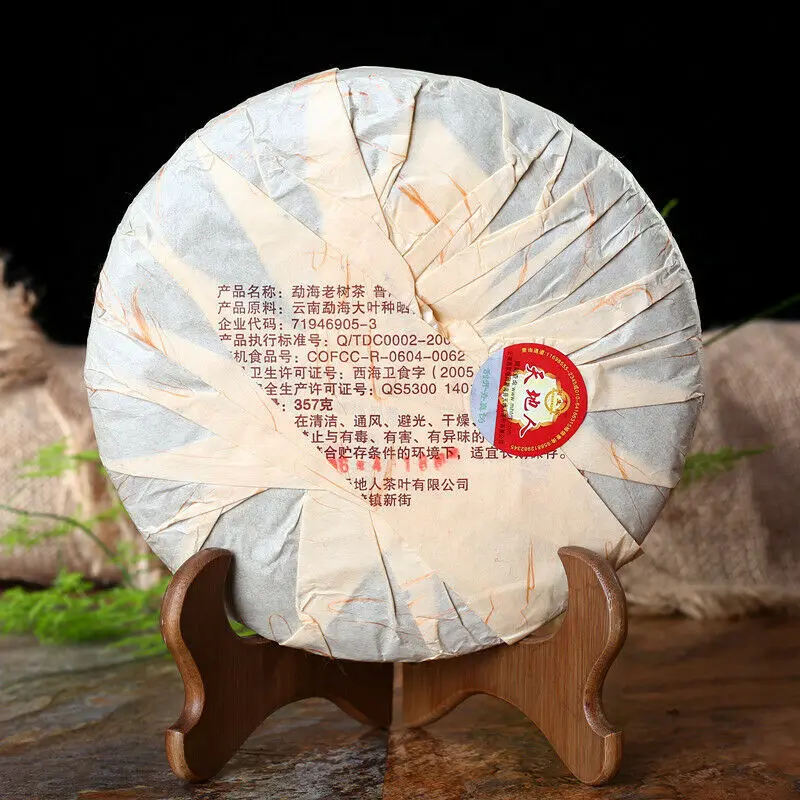 Китайский чай King Menghai из ПУ-Erh, высококачественный черный чай Pu'er с изображением старого дерева, 357 г
Китайский чай King Menghai из ПУ-Erh, высококачественный черный чай Pu'er с изображением старого дерева, 357 г