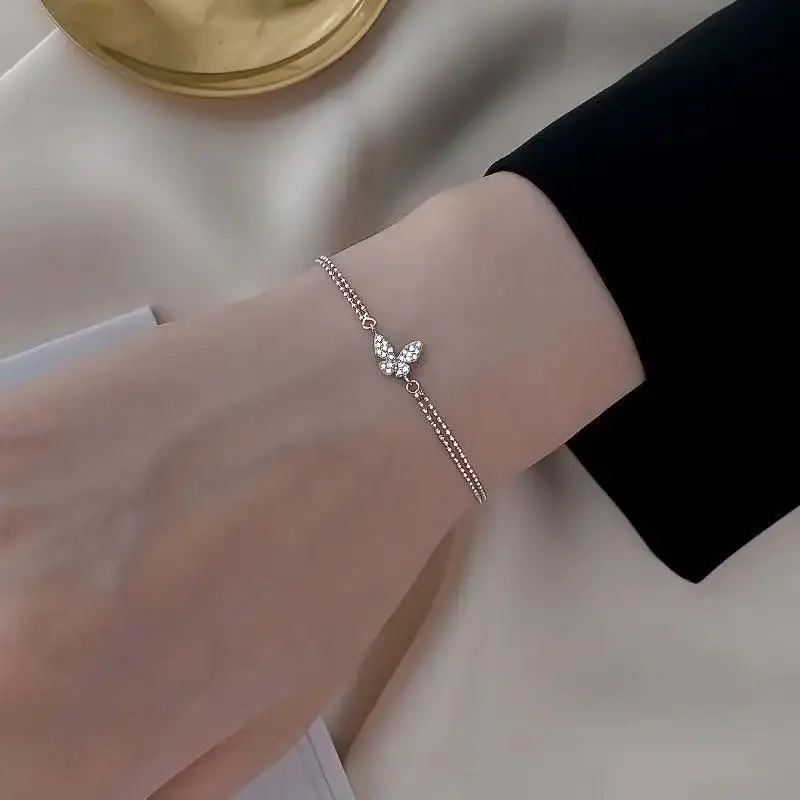 2023 Sweet Shining Zircon Butterfly Bracelet for Women Anti-Allergic Silver Color Color Chain Bling Bracelet with Stamp Gift
2023 Sweet Shining Zircon Butterfly Bracelet for Women Anti-Allergic Silver Color Color Chain Bling Bracelet with Stamp Gift