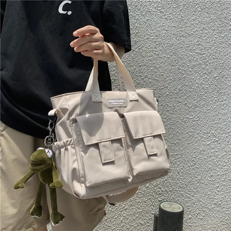 Nylon Waterproof Canvas Handbags Crossbody Bags for Women Men Shoulder Messenger Bag Youth Girls School Bags Harajuku Tote Bag
Nylon Waterproof Canvas Handbags Crossbody Bags for Women Men Shoulder Messenger Bag Youth Girls School Bags Harajuku Tote Bag